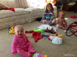 Just at the beginning of making big messes! I was around the corner and didn't realize the wipes were so accessible to Adelynn (back), when I came close and found wipes everywhere i asked, 'what are you doing?' this is the grin I got from everyone!