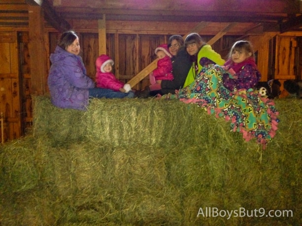 6 sisters sitting on hay bales
