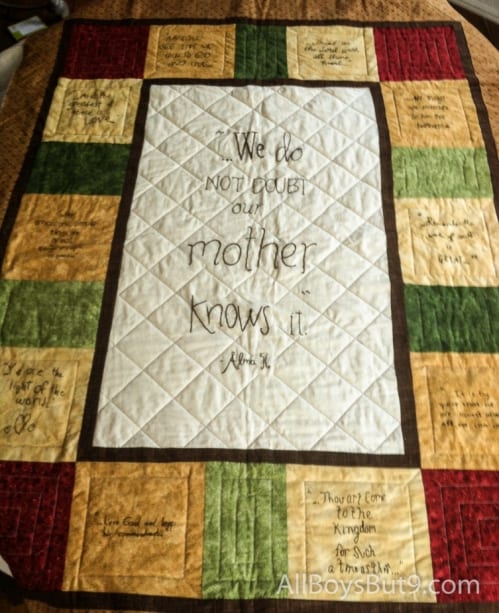 a quilt handmade by our 9 daughters (our son contributed his scripture from Argentina)