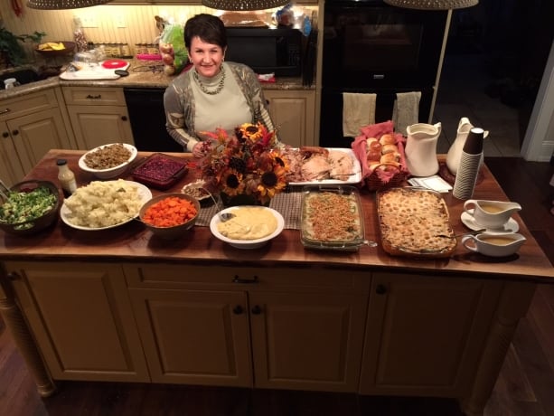 CaMarie in front of our Thanksgiving Feast